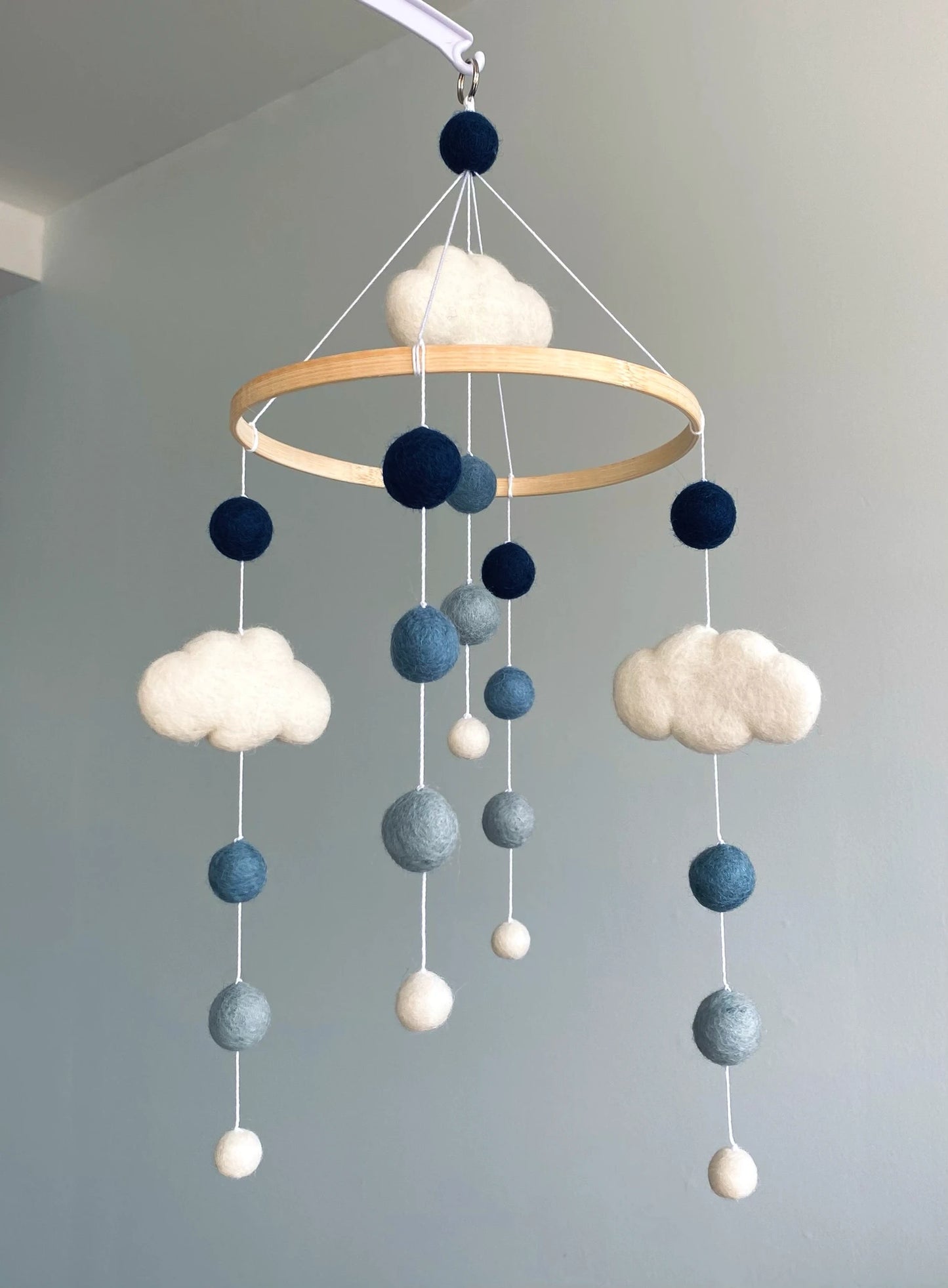 Pom pom mobile with clouds