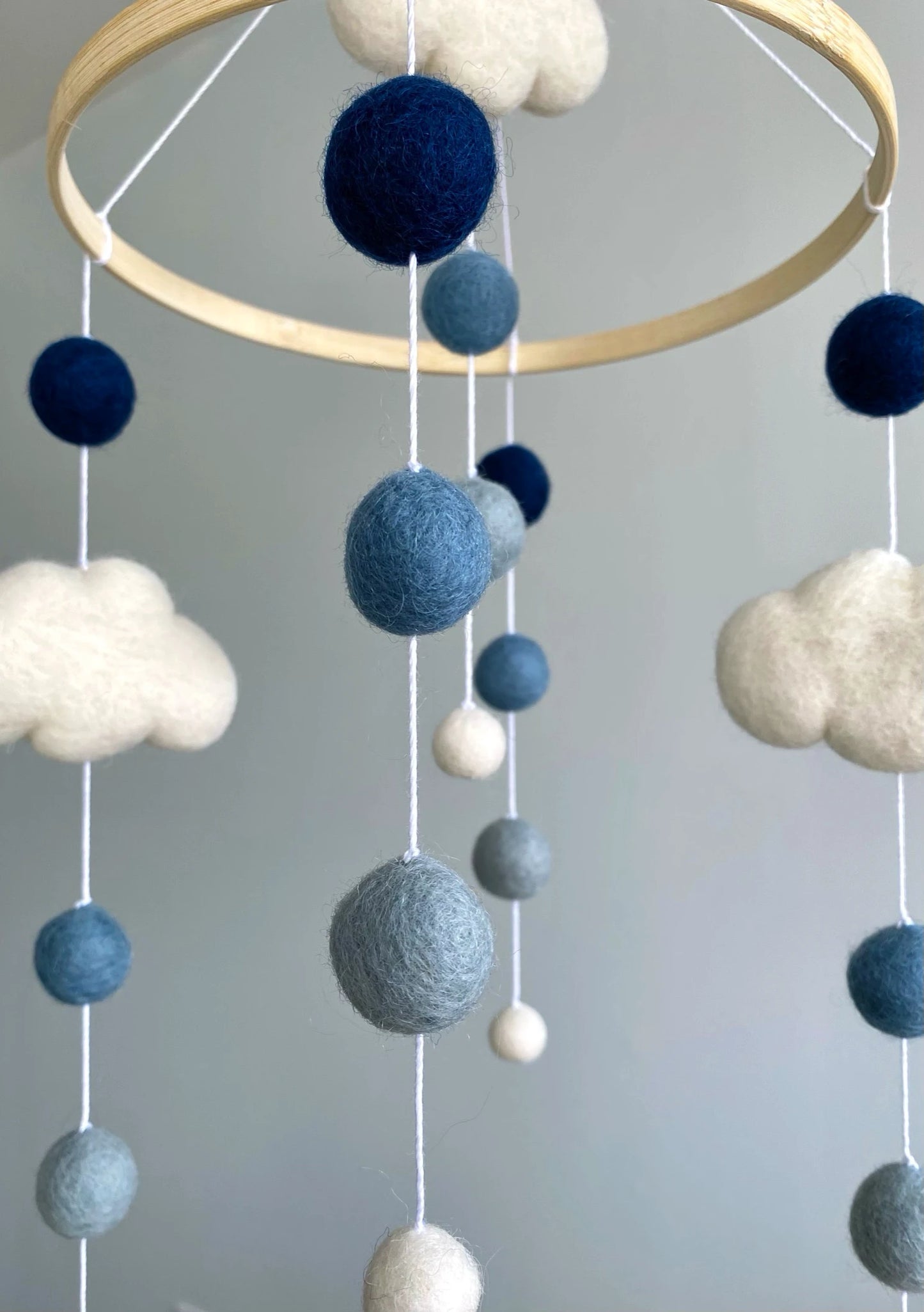 Pom pom mobile with clouds