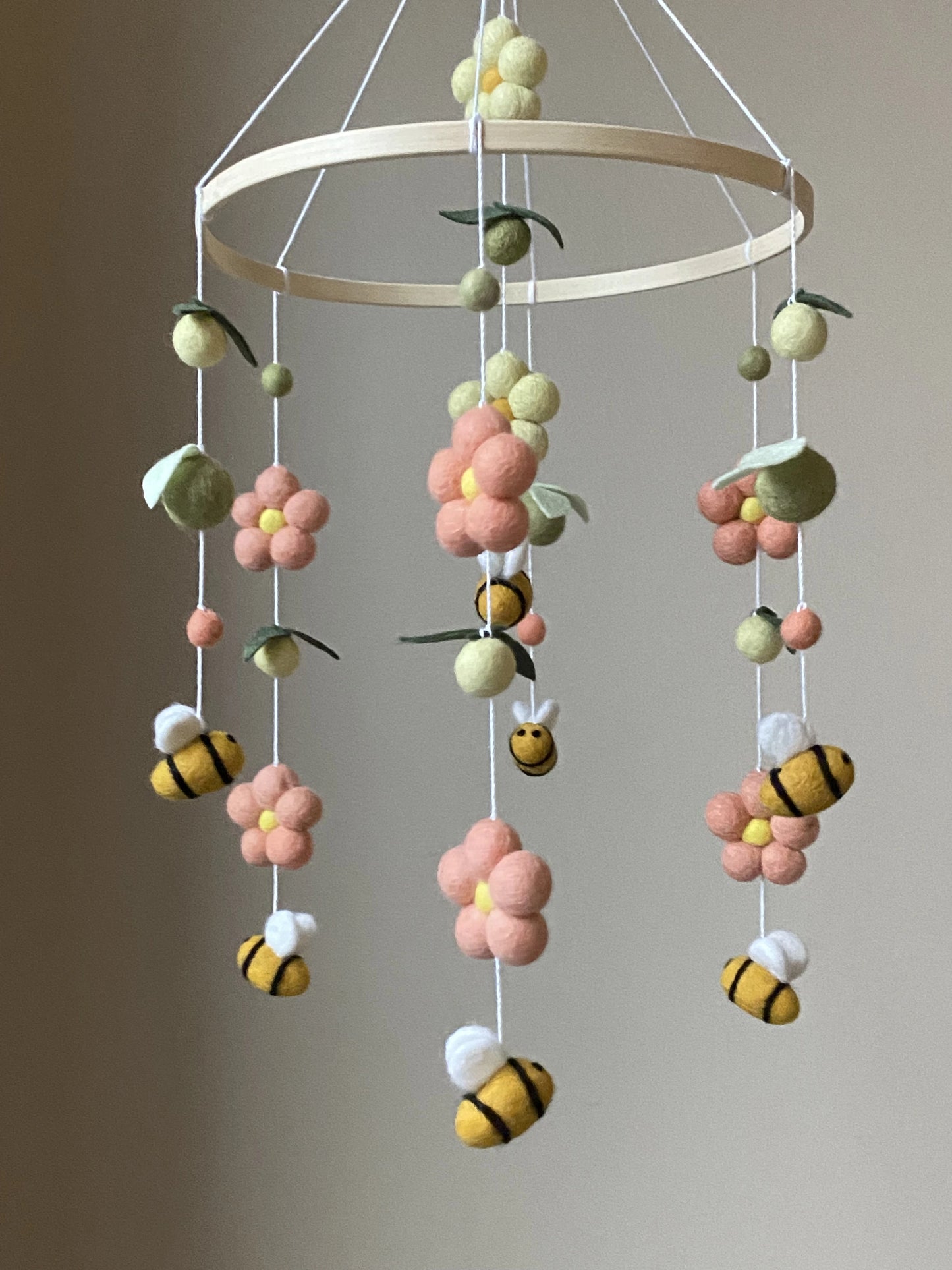 Bee baby mobile with daisies