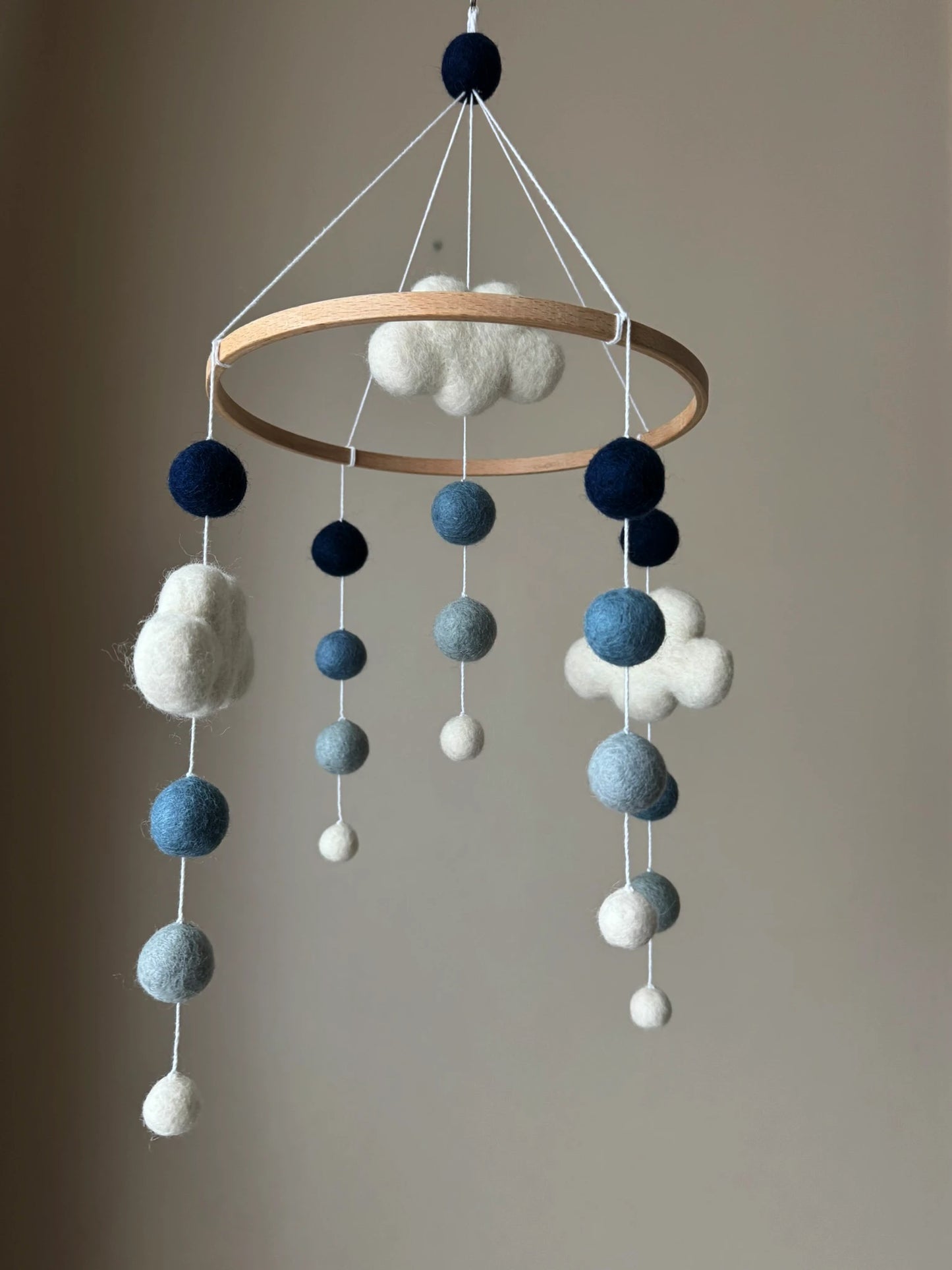 Pom pom mobile with clouds