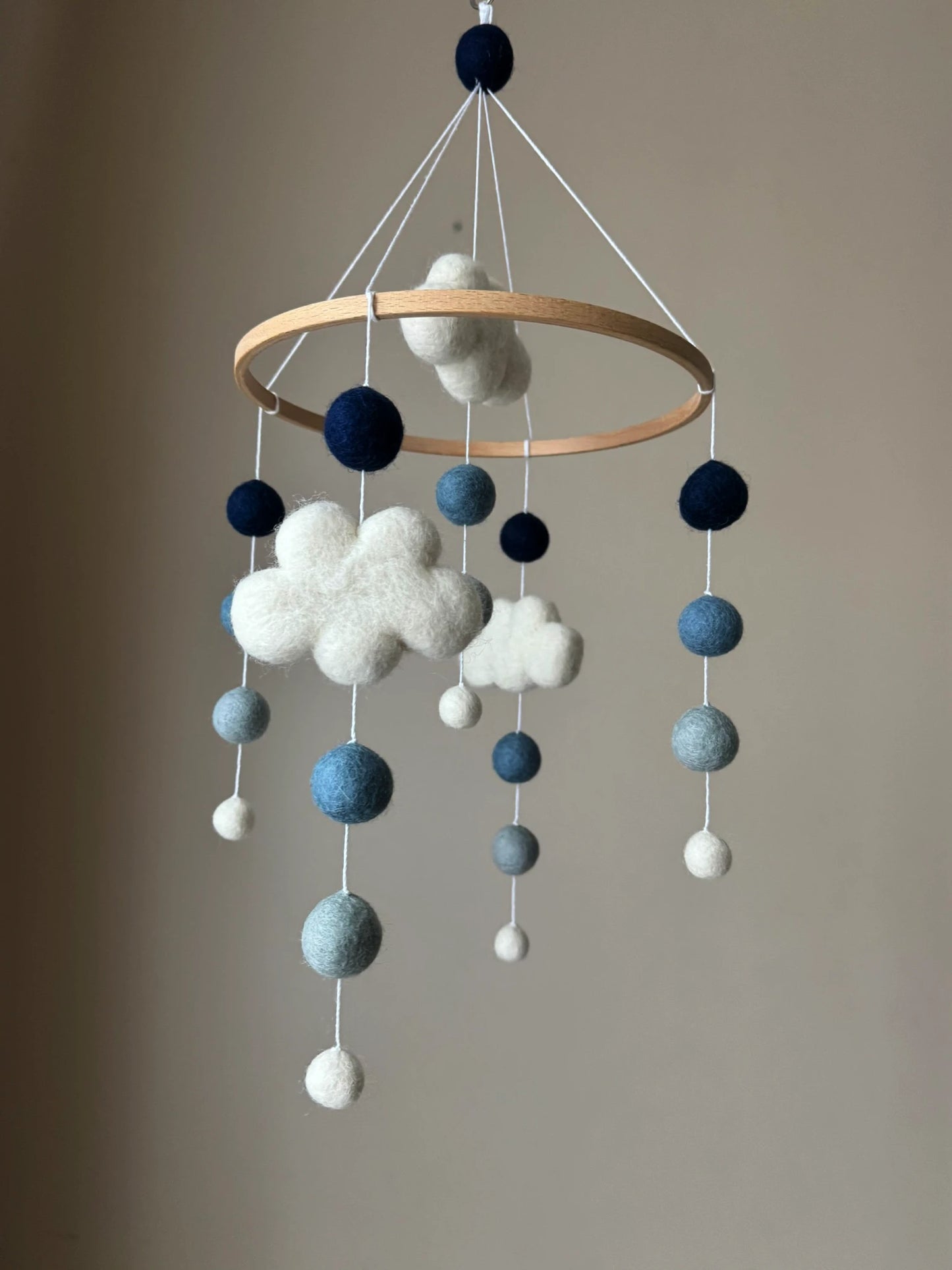 Pom pom mobile with clouds