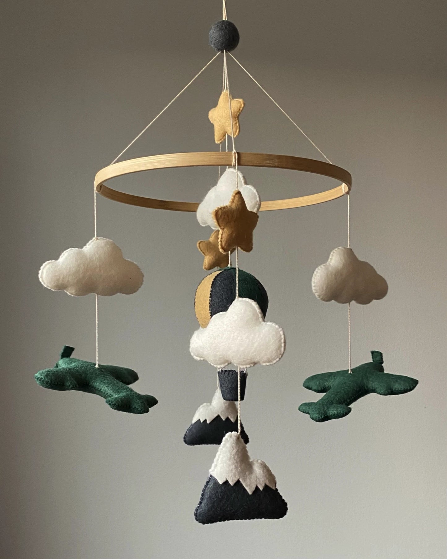 Airplane crib mobile with mountains