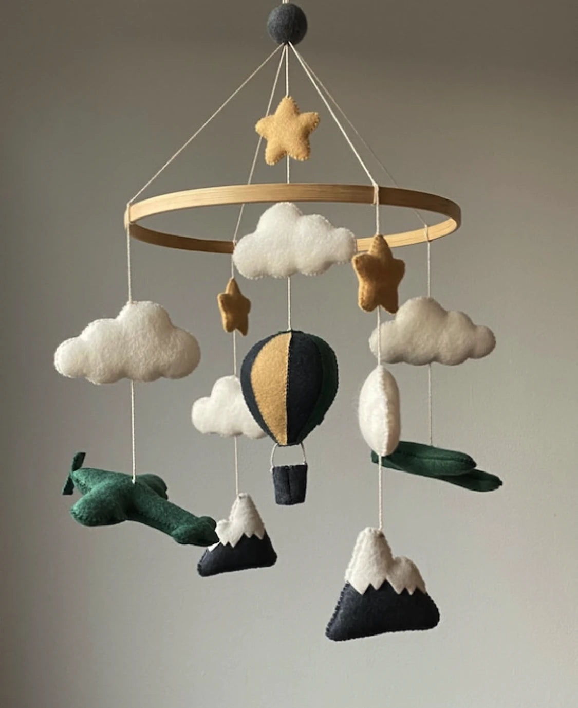Airplane crib mobile with mountains