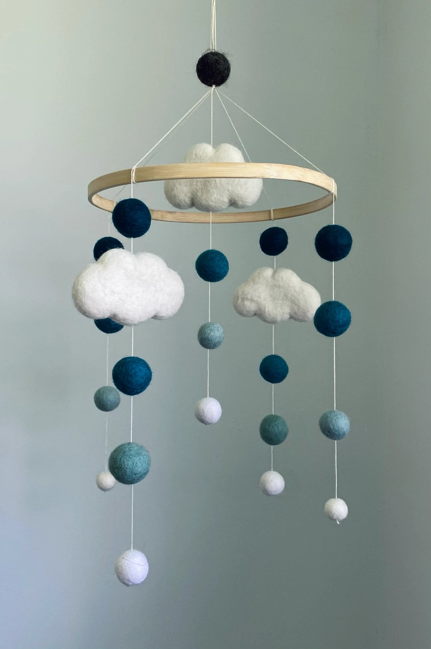 Pom pom mobile with clouds