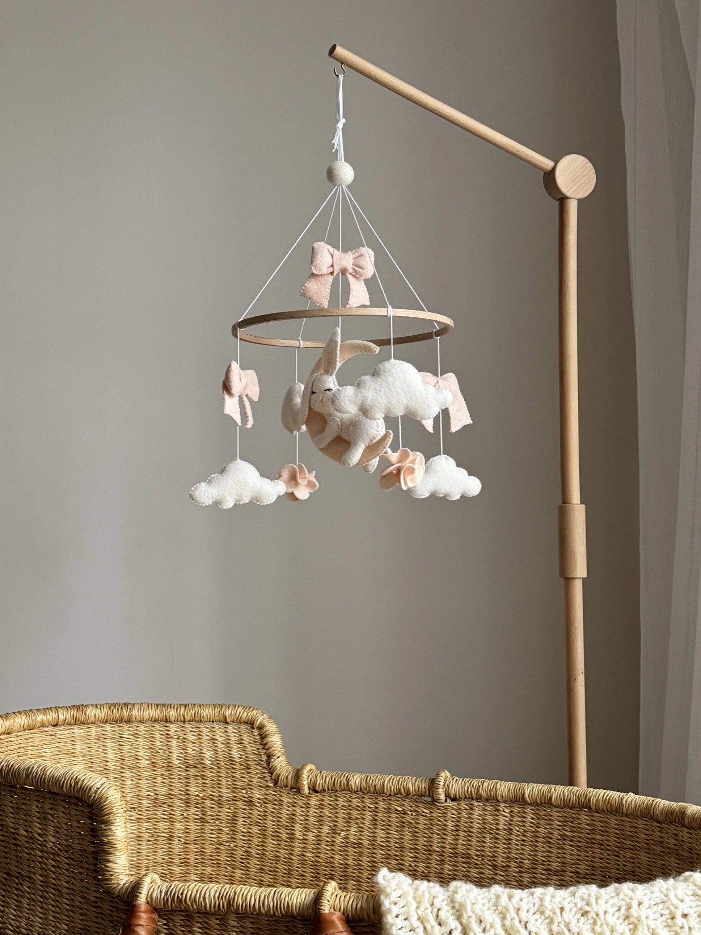 Bunny on the moon baby mobile with bows and clouds in blush neutral tones