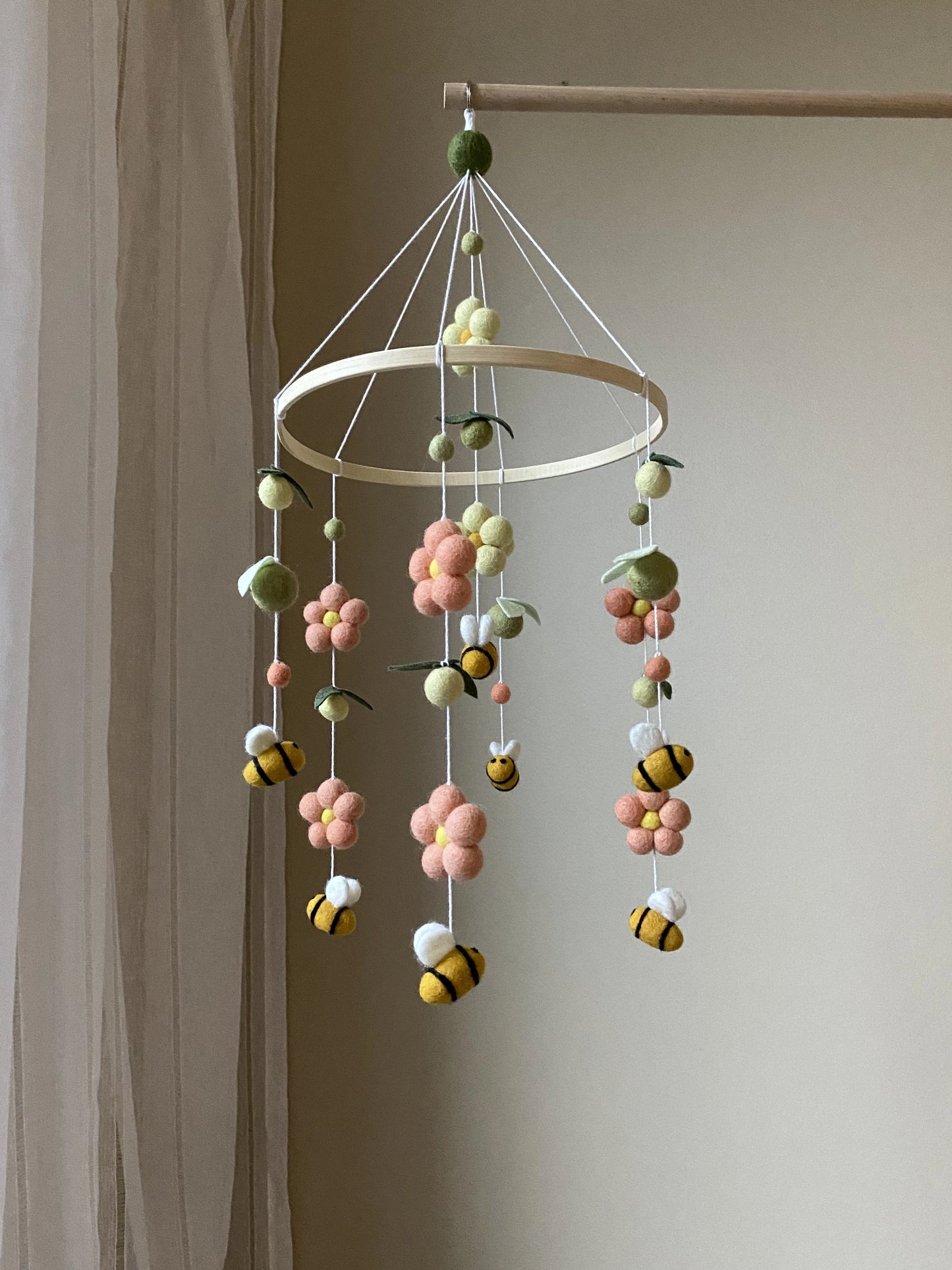Bee baby mobile with daisies