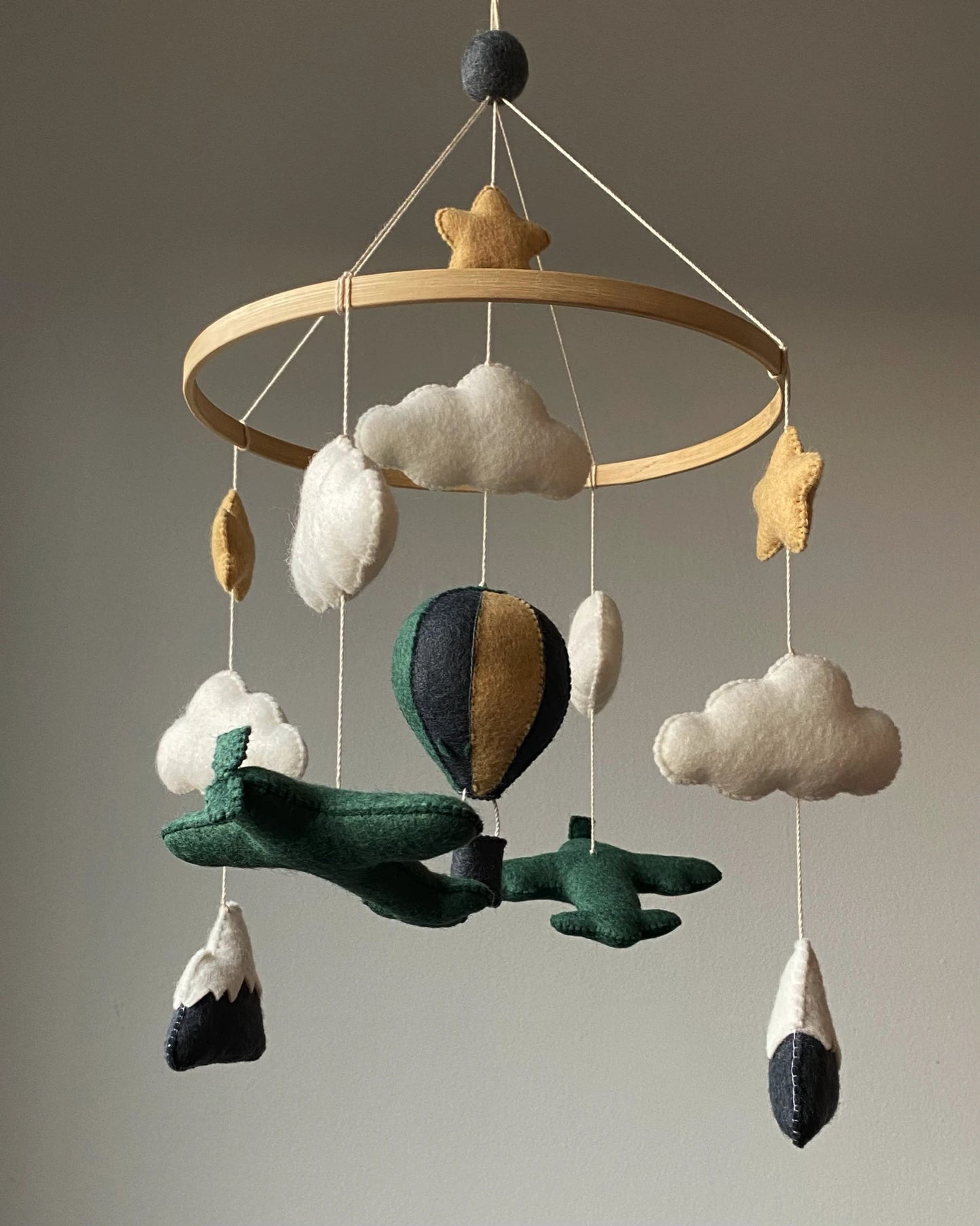 Airplane crib mobile with mountains