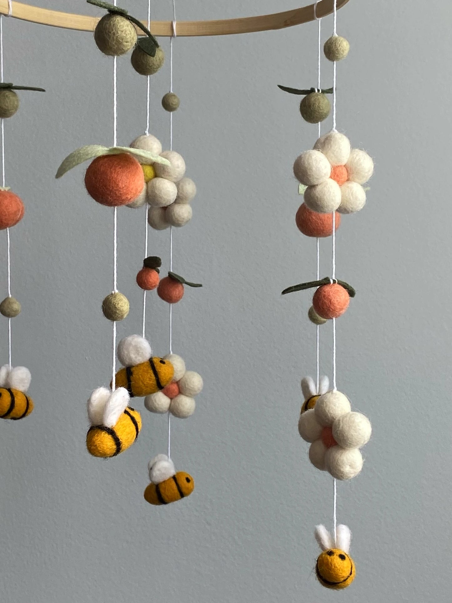 Bee mobile with daisies