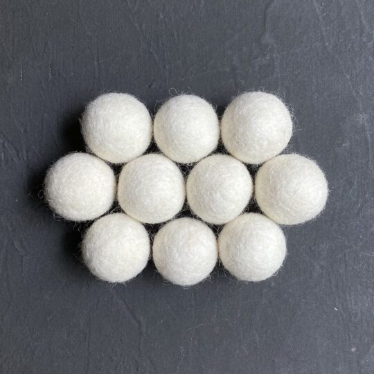 cream wool felt balls