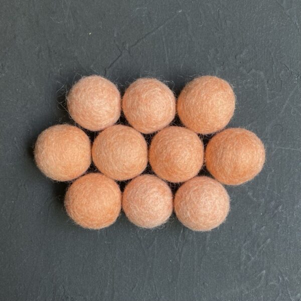 Peach wool felt balls