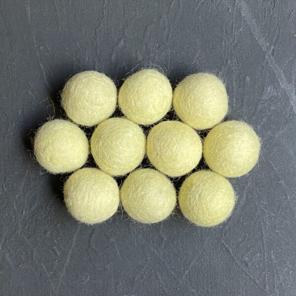 Yellow light wool felt balls