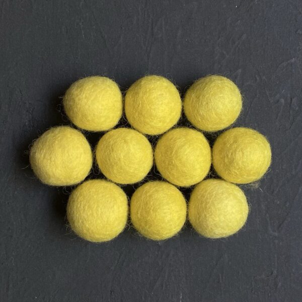 Yellow wool felt balls