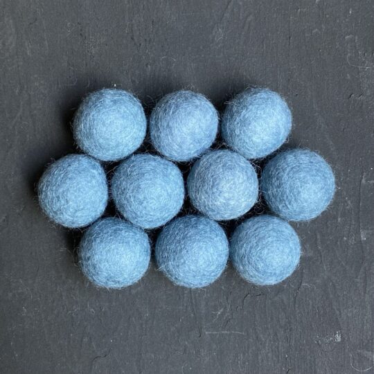 Light blue wool felt balls