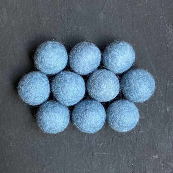 Light blue wool felt balls