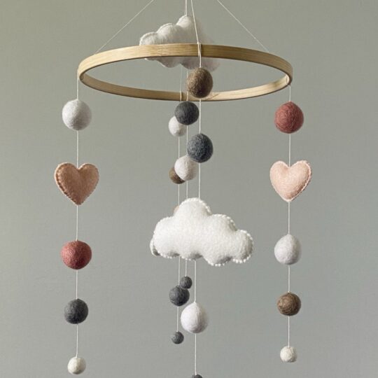 Felt ball mobile for a baby girl