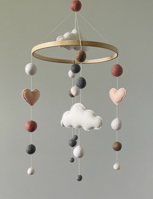 Felt ball mobile for a baby girl