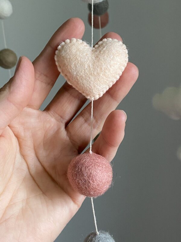 Felt ball mobile for a baby girl