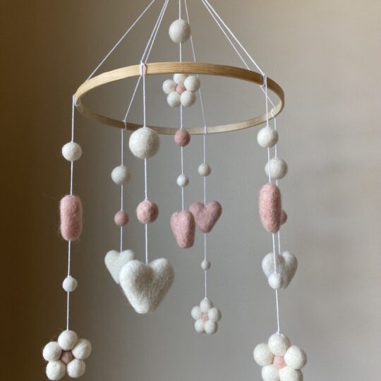 Floral baby mobile with hearts and balls for girl nursery