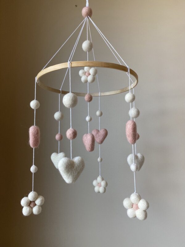 Floral baby mobile with hearts and balls for girl nursery