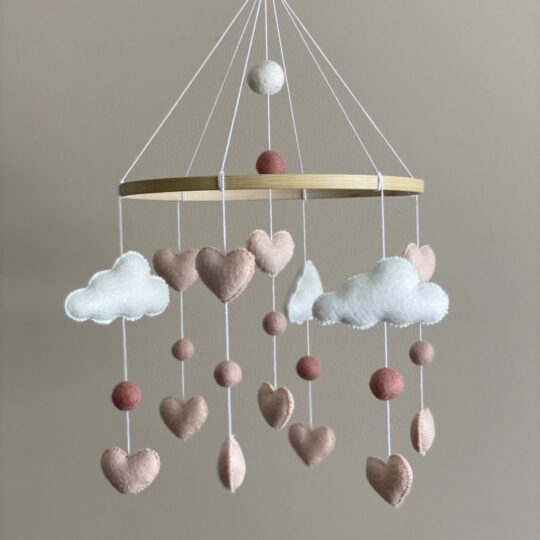 Clouds mobile with pink hearts