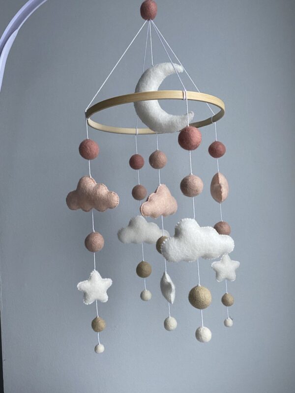 Baby mobile with moon and pink clouds