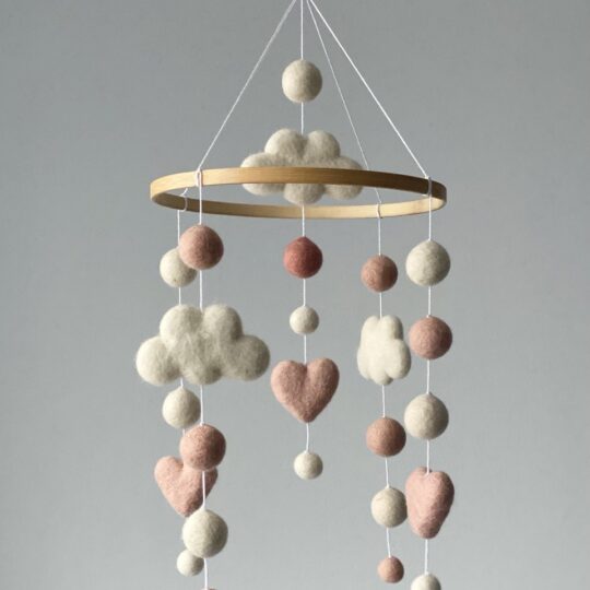 Cute felt balls mobile with hearts and clouds