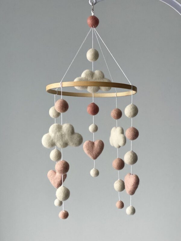 Cute felt balls mobile with hearts and clouds